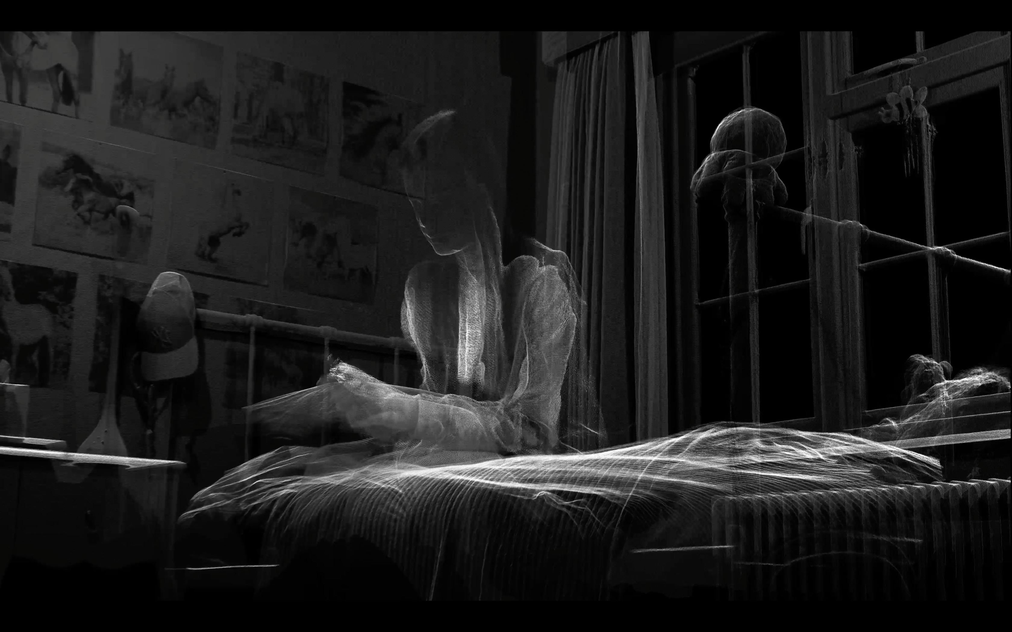 Still from Molly vs the Machines. A dark, monochrome scene of a bedroom, where a translucent, ghost-like human figure appears to be sitting on a bed, reading or drawing. The figure has an X-ray-like texture, creating a double-exposure effect. In the background, pictures of horses hang on the wall.